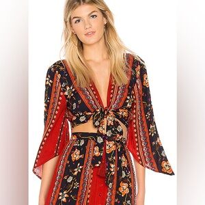 Revolve BAND OF GYPSIES Bohemian Tie Front Blouse in Rust & Navy
Medium